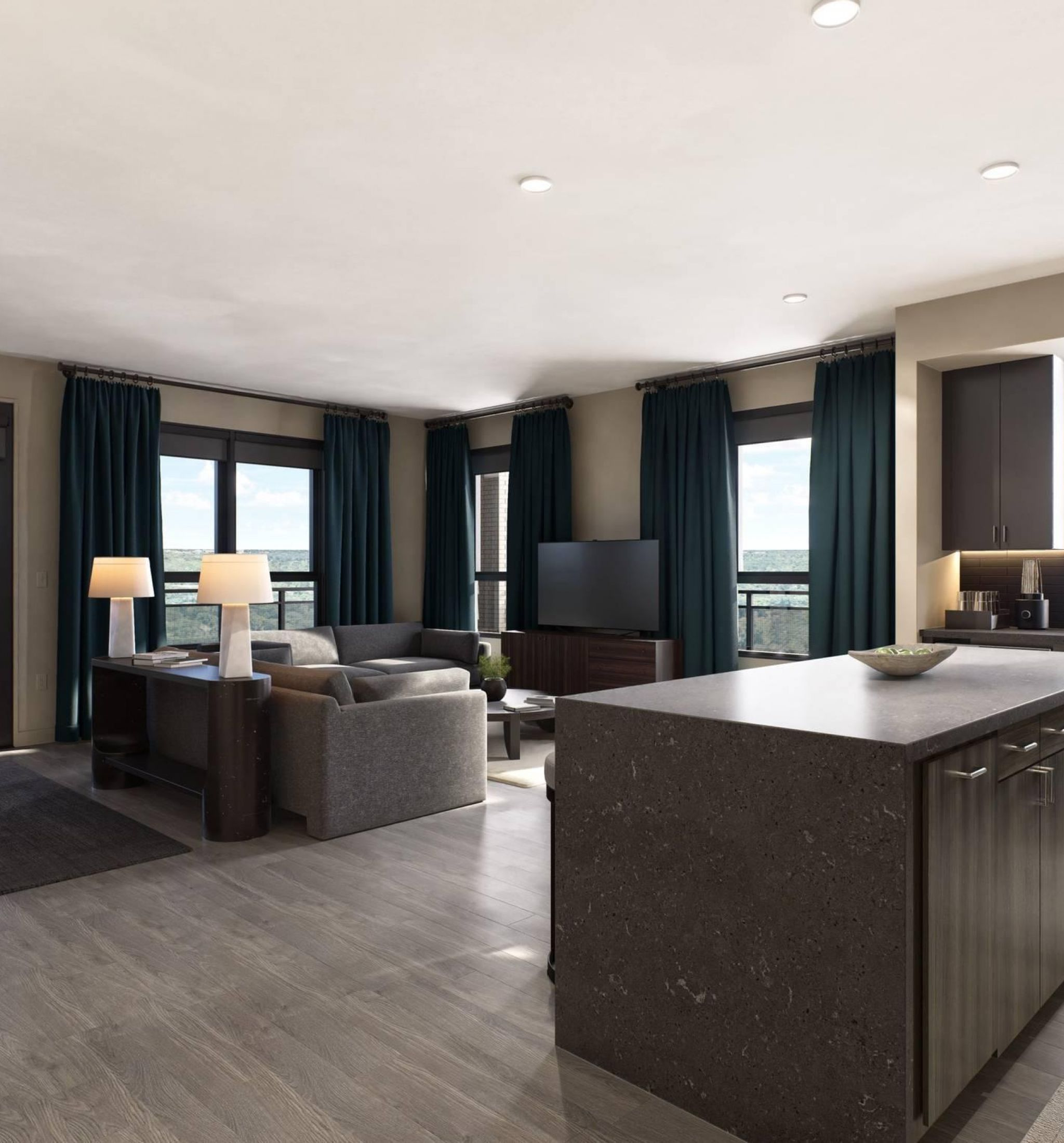 Oberon A cozy bedroom featuring a large bed and a ceiling fan, creating a comfortable and inviting atmosphere.