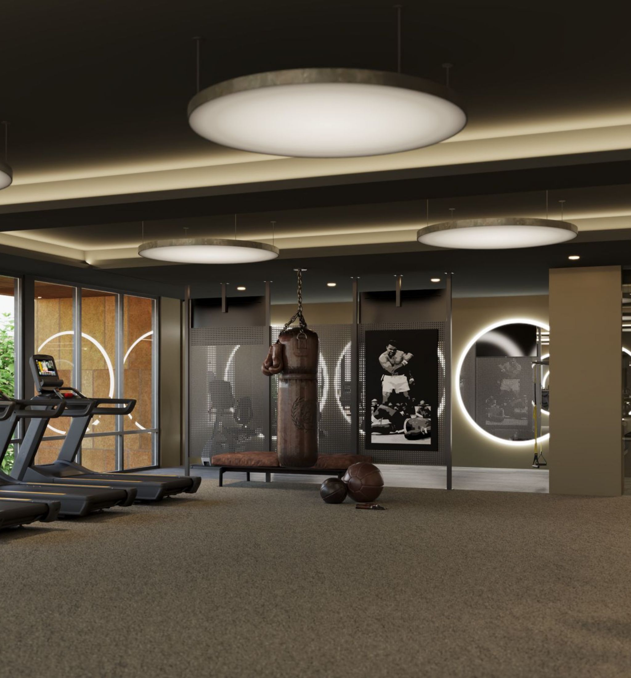 Oberon A gym room featuring multiple treadmills and various exercise equipment arranged for fitness activities.