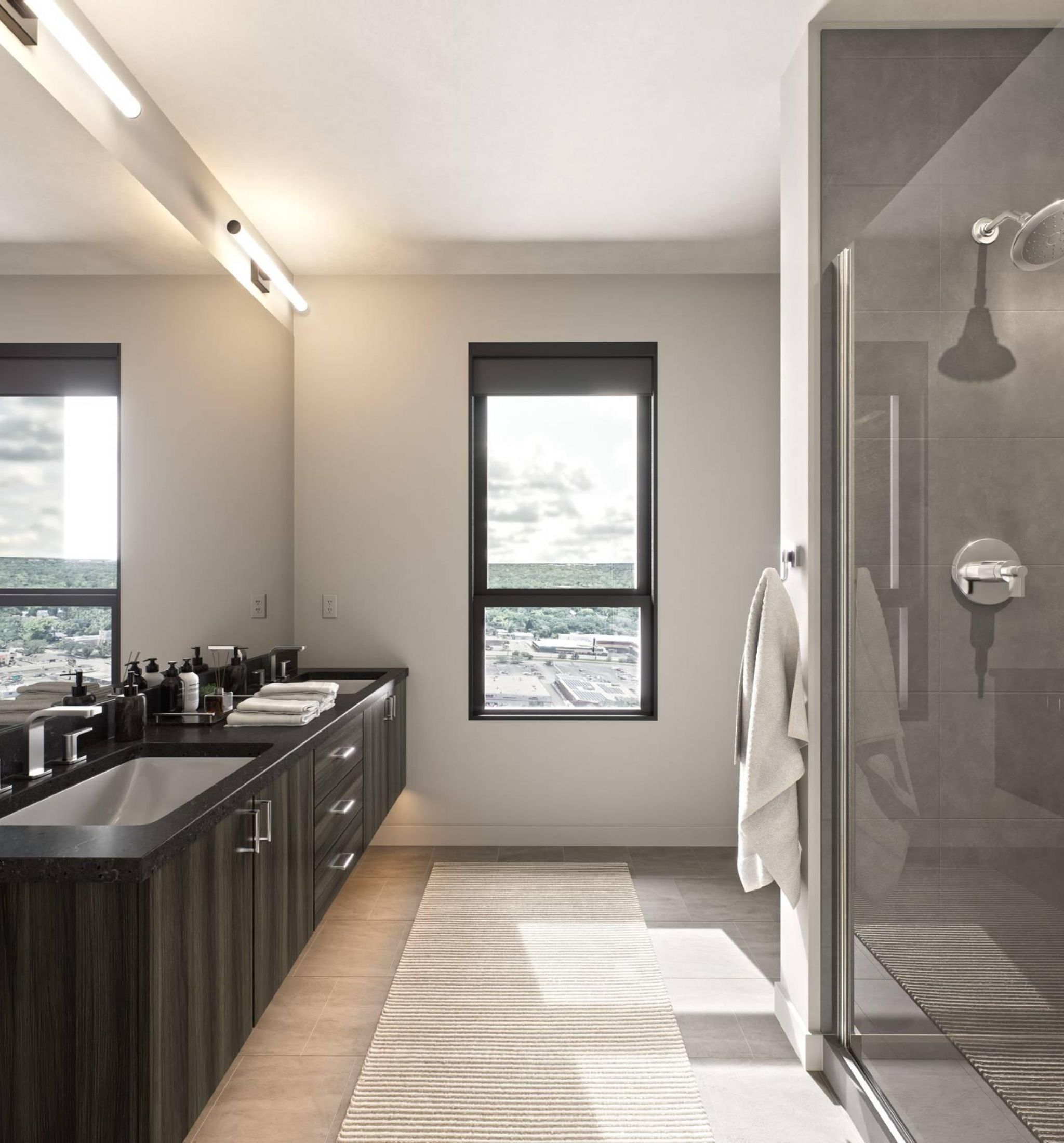 The Oberon A sleek modern bathroom featuring a glass shower door and contemporary fixtures, emphasizing a clean and stylish design.